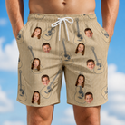 Model wearing Men's Strum Supreme Custom Face Beach Shorts printed with kids' faces