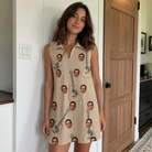 Real-life photo of someone wearing Women's Strum Supreme Custom Face V-Neck Dress — custom faces printed all-over