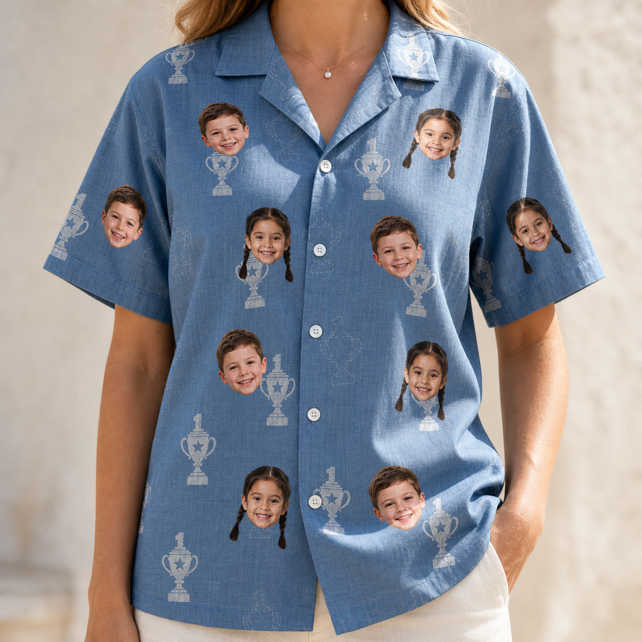 Model wearing Women's Trophy Toppers Custom Face Hawaiian Shirt printed with kids' faces