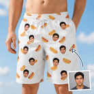 Man wearing Men's Mustard Mingle Custom Face Beach Shorts — custom faces printed all-over