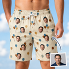 Man wearing Men's Affection Aloft Custom Face Beach Shorts — custom faces printed all-over