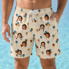 Model wearing Men's Affection Aloft Custom Face Beach Shorts printed with kids' faces