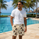 Real-life photo of someone wearing Men's Affection Aloft Custom Face Beach Shorts — custom faces printed all-over