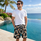 Real-life photo of someone wearing Men's Midnight Moonhoot Custom Face Beach Shorts — custom faces printed all-over