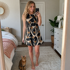 Full-length photo with the pet printed all over this Women's Midnight Moonhoot Custom Cat Face Tank Dress