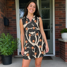 Real-life photo of someone wearing Women's Midnight Moonhoot Custom Face V-Neck Dress — custom faces printed all-over