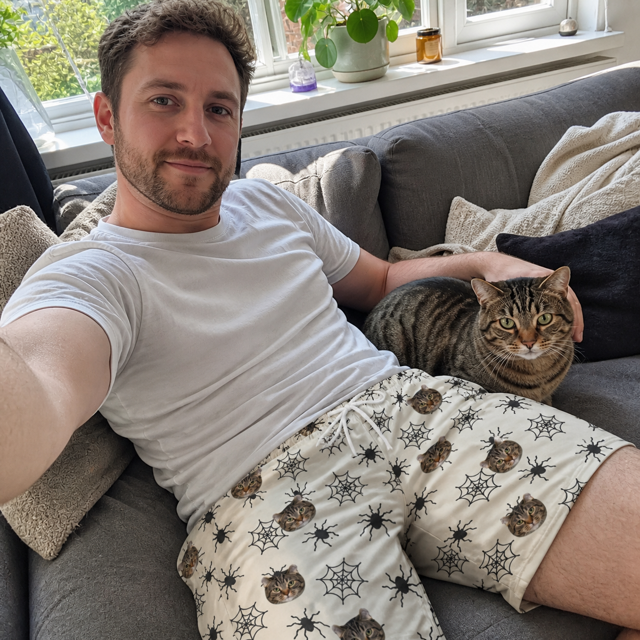 Selfie with the pet whose face is printed all over this Men's Tangle Terror Custom Cat Face Beach Shorts