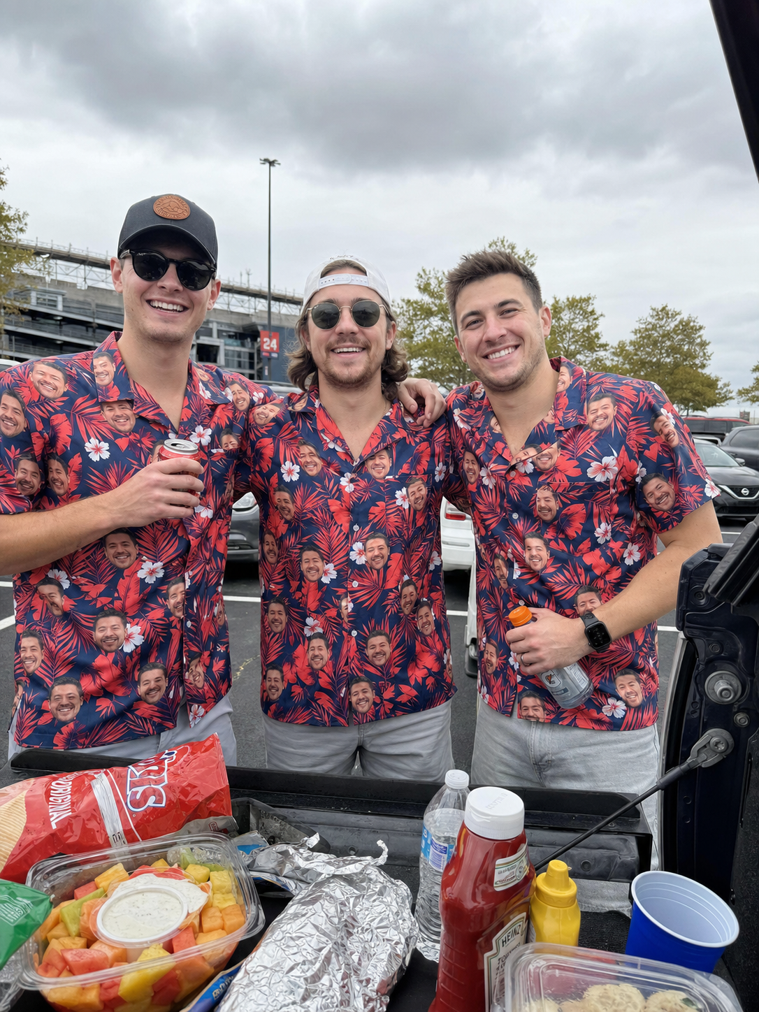 Friends tailgating in matching custom face Hawaiian shirts